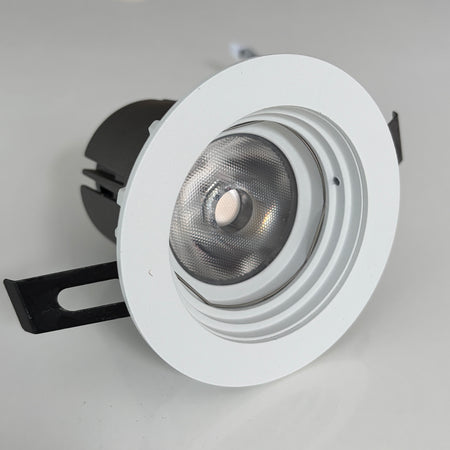 White recessed ceiling light on a gray background