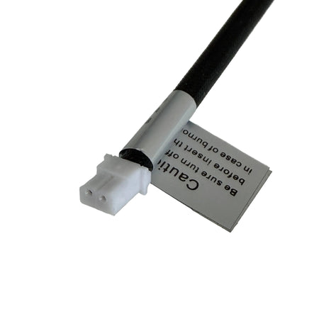 Black cable with a white connector on a gray background